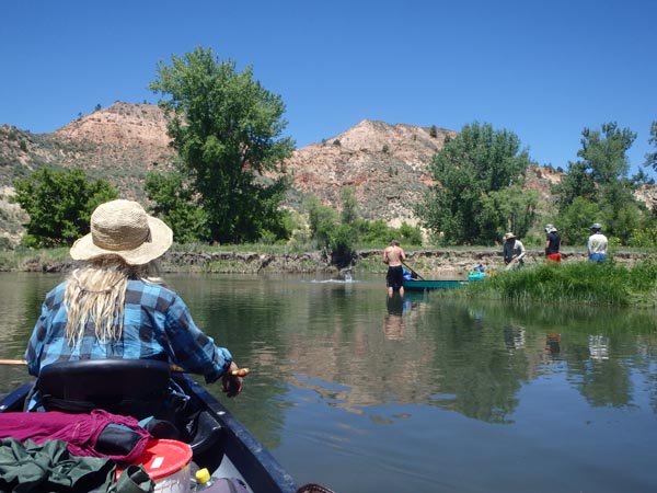 Floating the Tongue River by canoe.