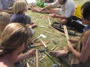 Making bowdrill fire starters at Rabbitstick Rendezvous.